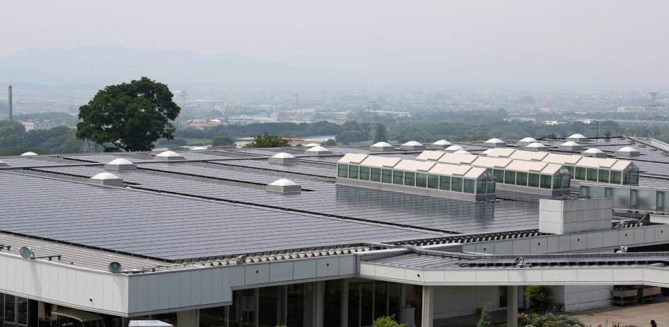 Installing SunPower (TotalEnergies) solar panels on the roof at Sasyunkan co, Kumamoto, Japan.

